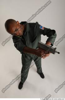 17 2018 01 ERIC IN ACTION WITH GUN